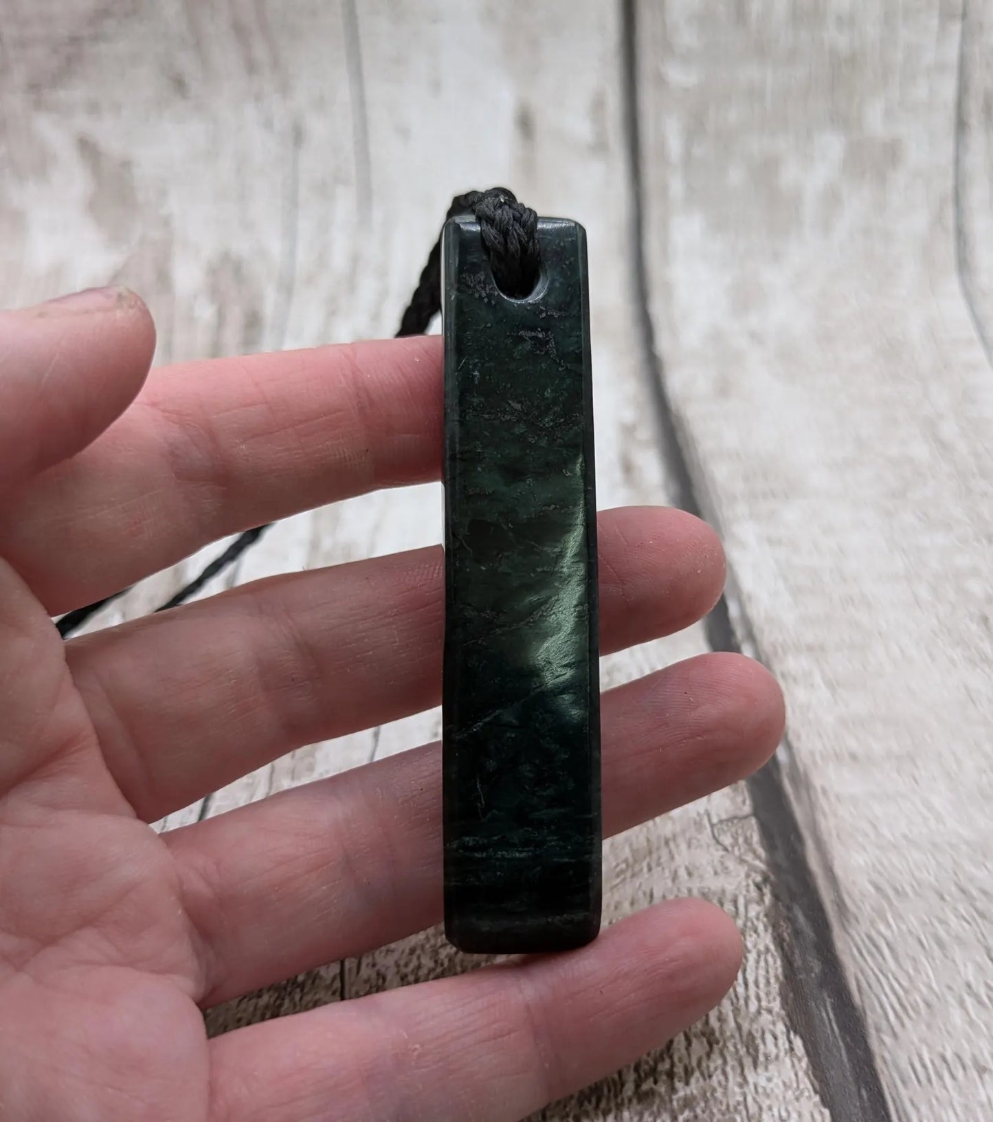 New Zealand serpentine Toki style Pounamu pendant.