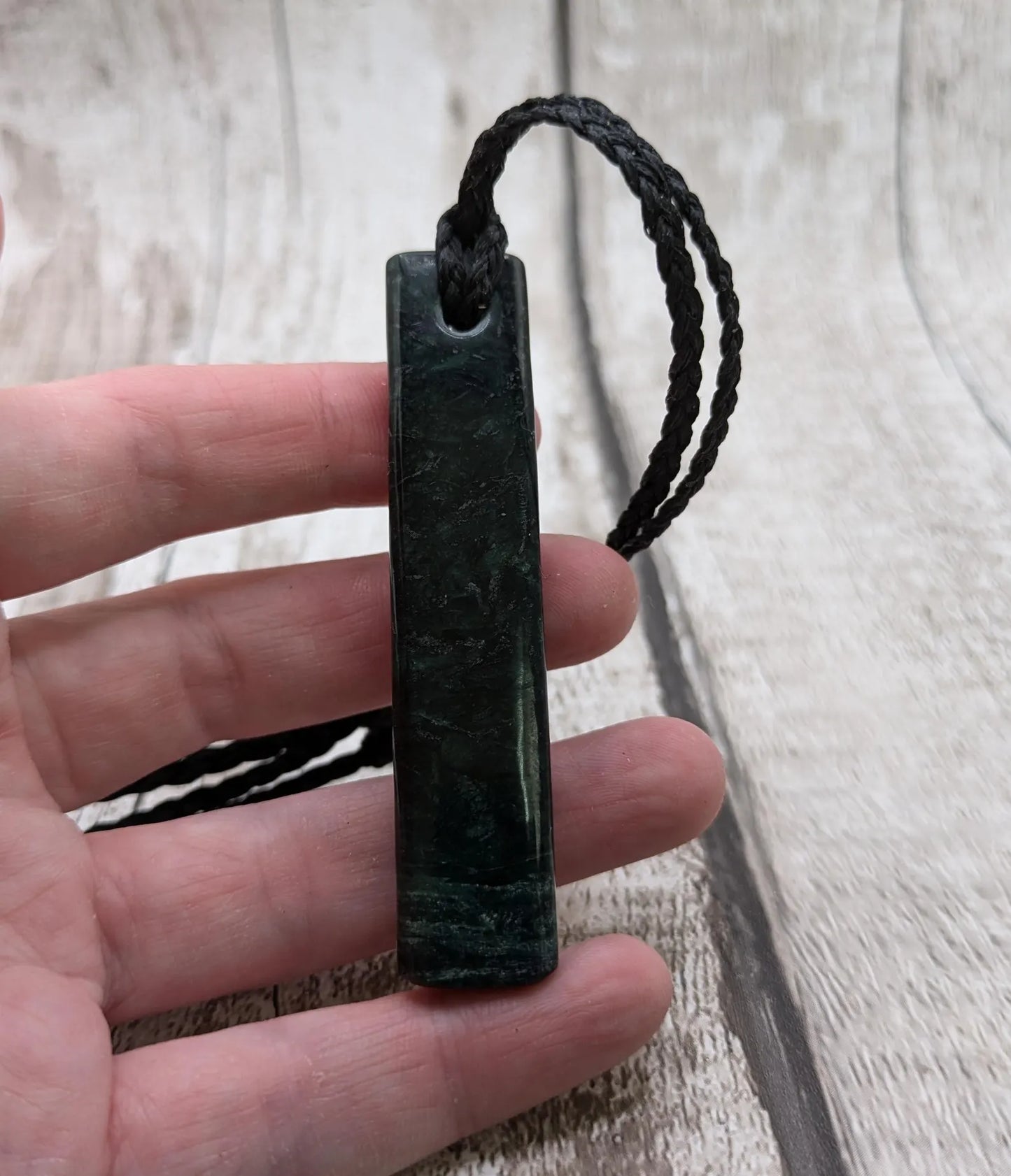 New Zealand serpentine Toki style Pounamu pendant.