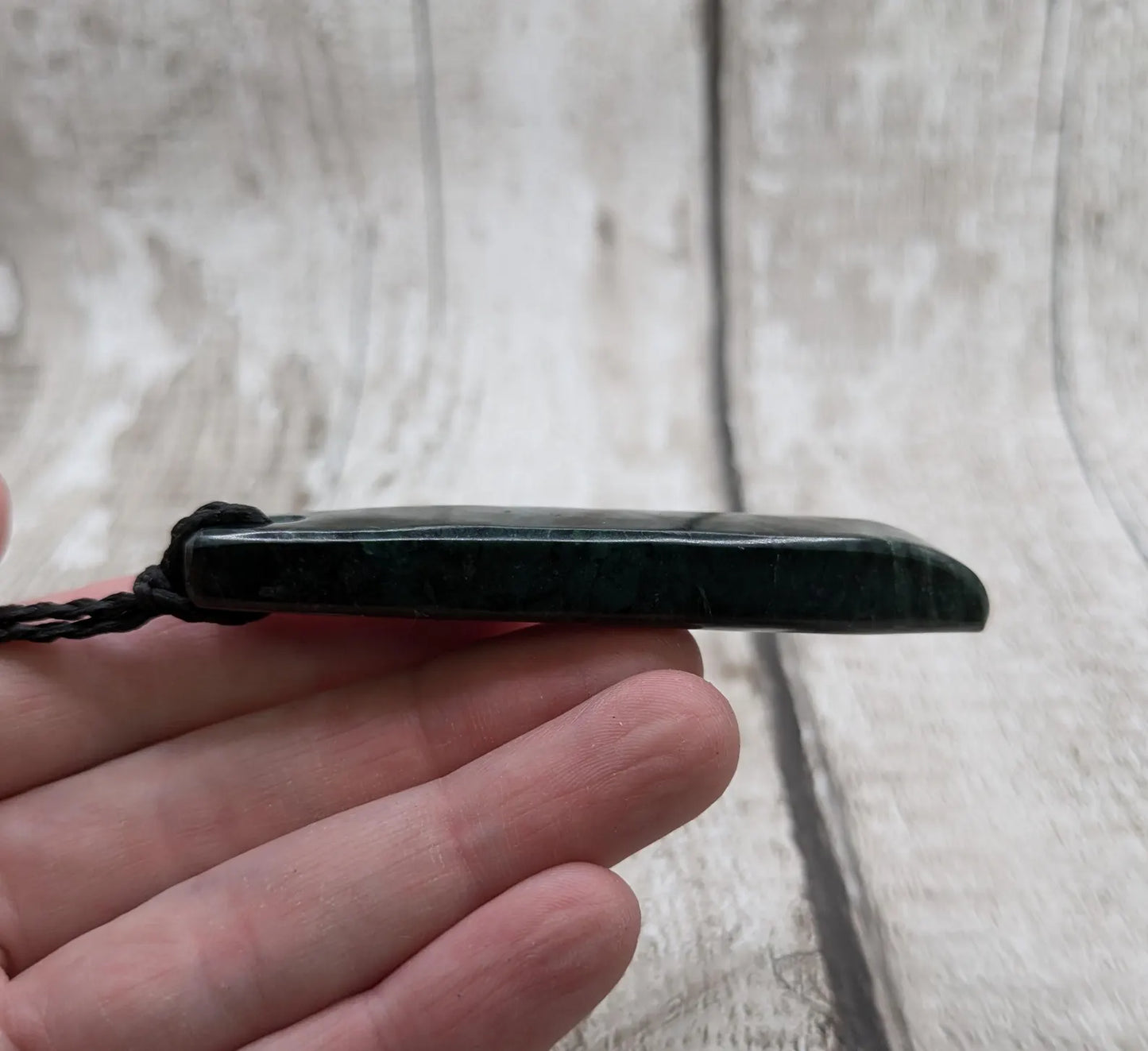 New Zealand serpentine Toki style Pounamu pendant.