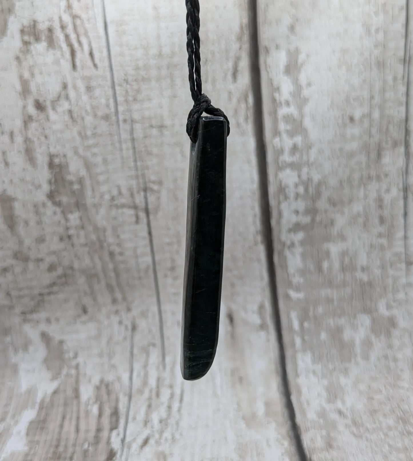 New Zealand serpentine Toki style Pounamu pendant.