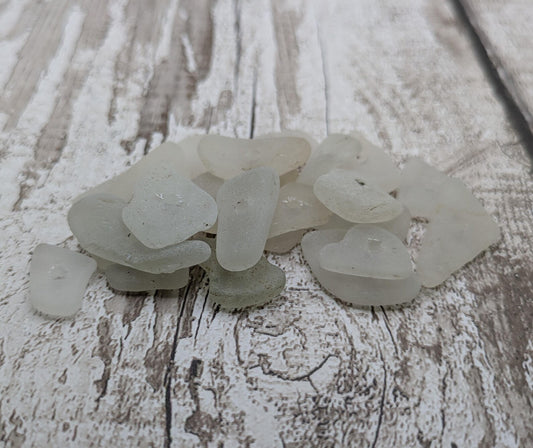 White frosted Center drilled sea glass beads.