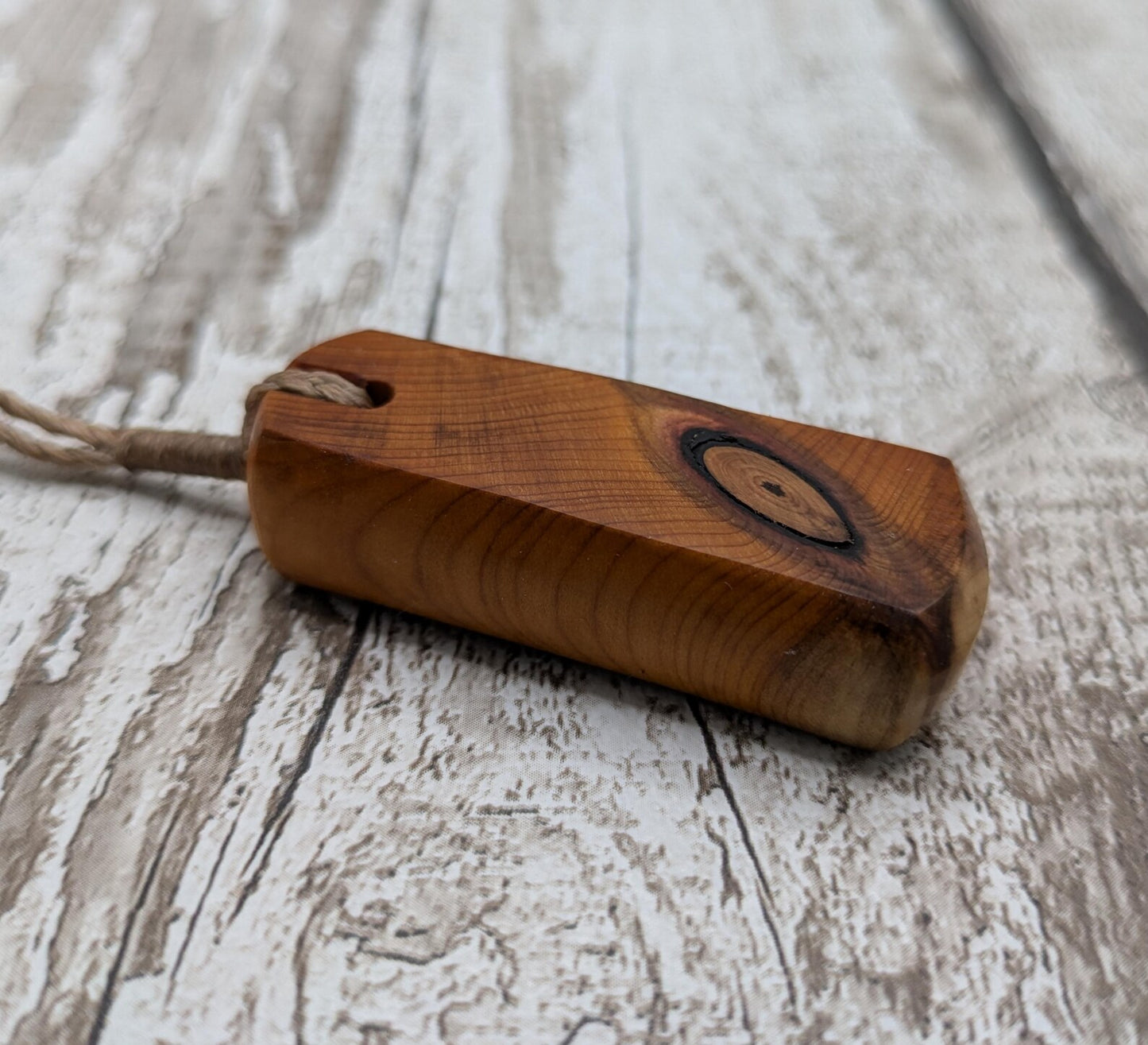 Chunky yew wood roimata tear drop pendant.