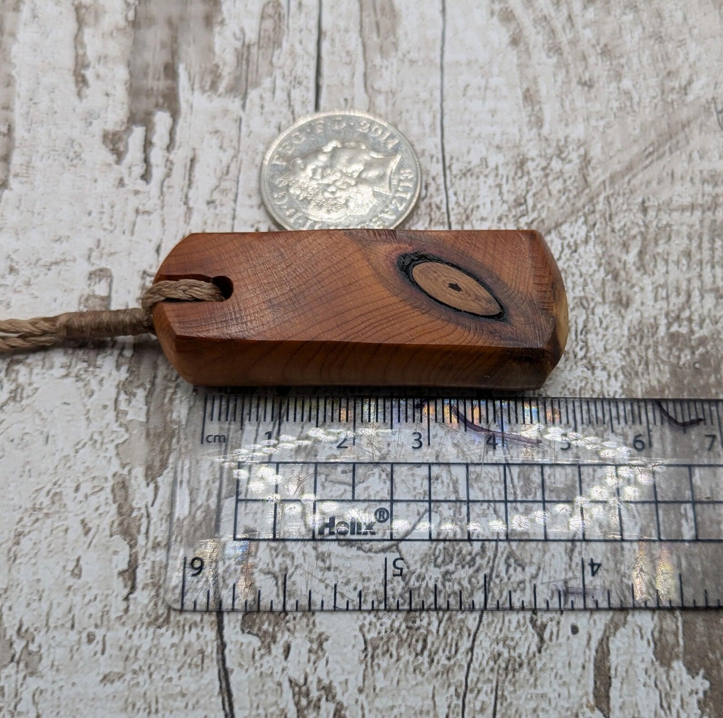 Chunky yew wood roimata tear drop pendant.