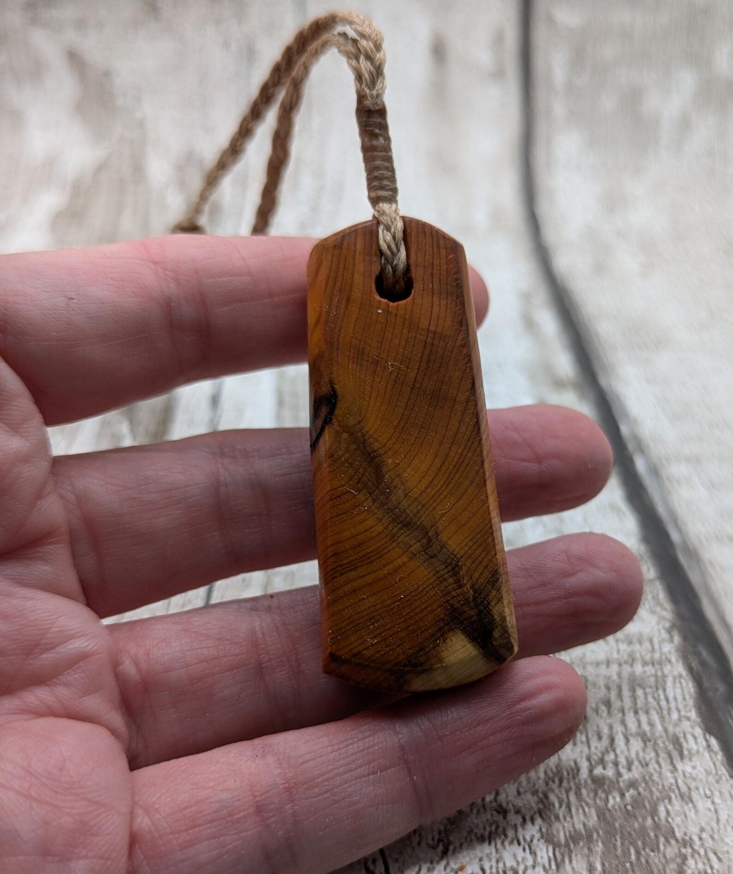 Chunky yew wood roimata tear drop pendant.