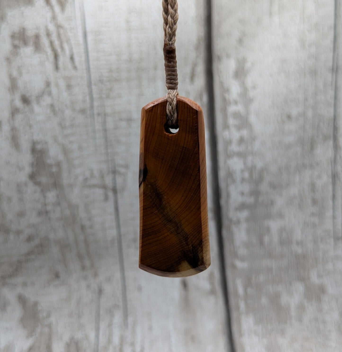 Chunky yew wood roimata tear drop pendant.