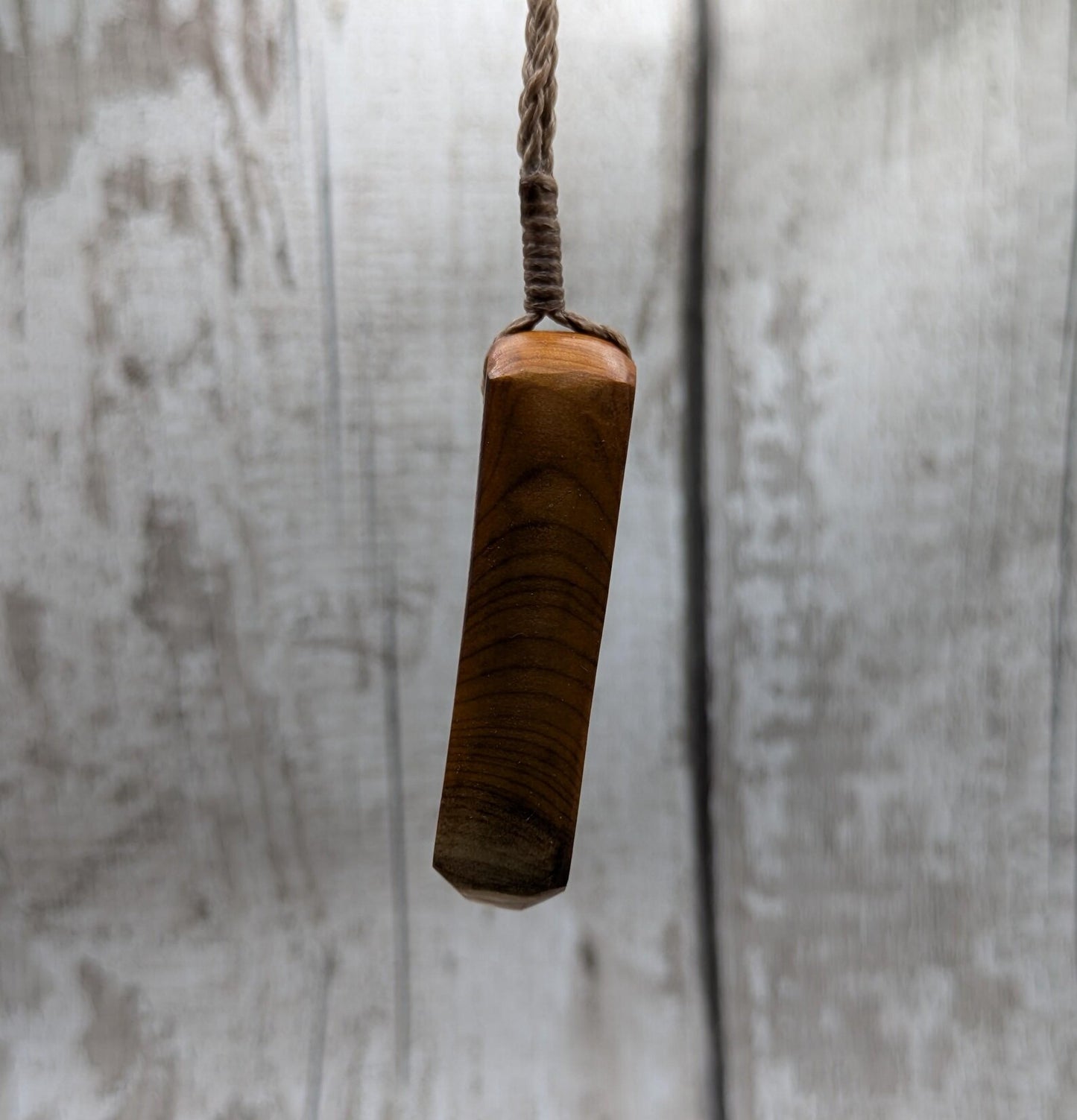 Chunky yew wood roimata tear drop pendant.