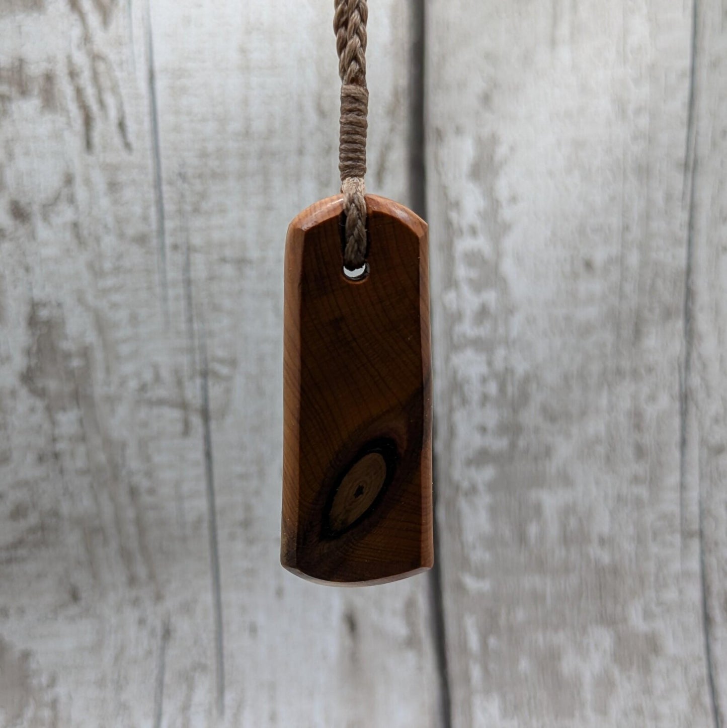 Chunky yew wood roimata tear drop pendant.