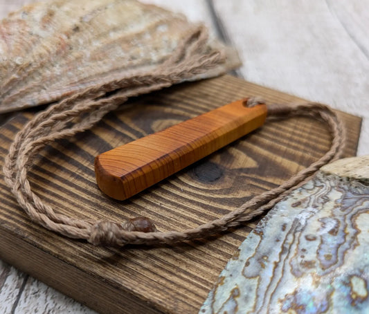 Yew wood roimata teardrop pendant.