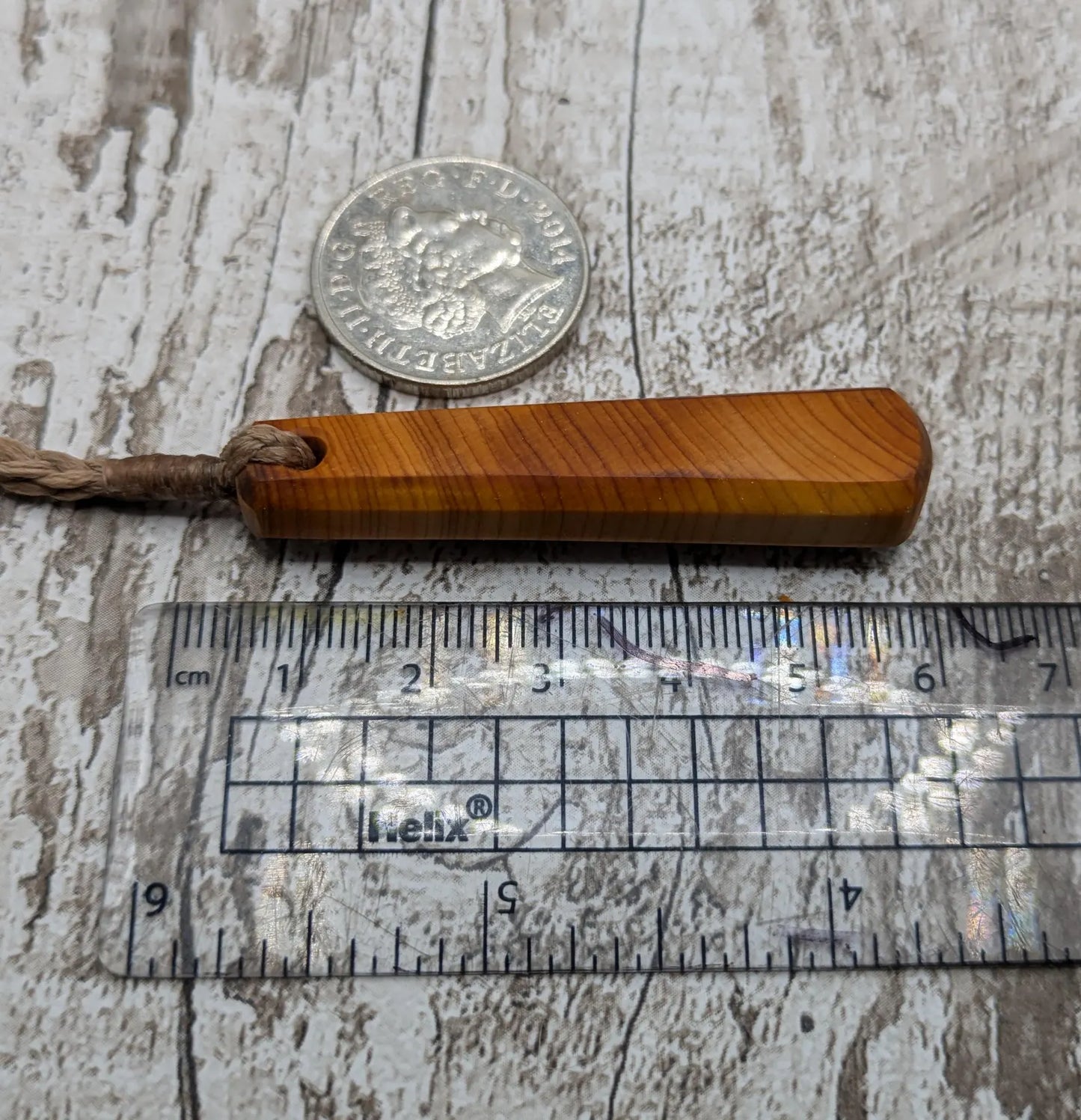 Yew wood roimata teardrop pendant.