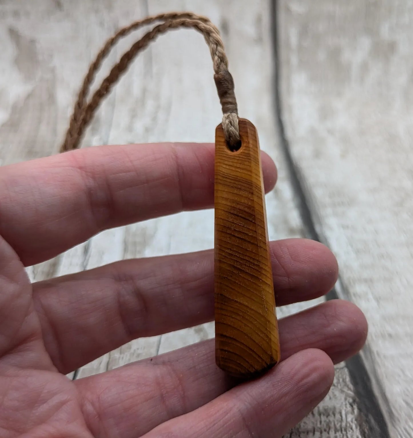 Yew wood roimata teardrop pendant.