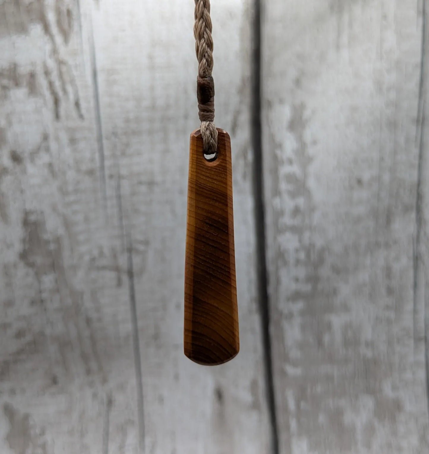 Yew wood roimata teardrop pendant.