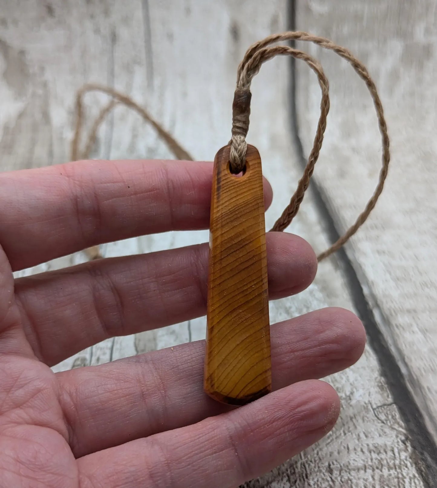 Yew wood roimata teardrop pendant.