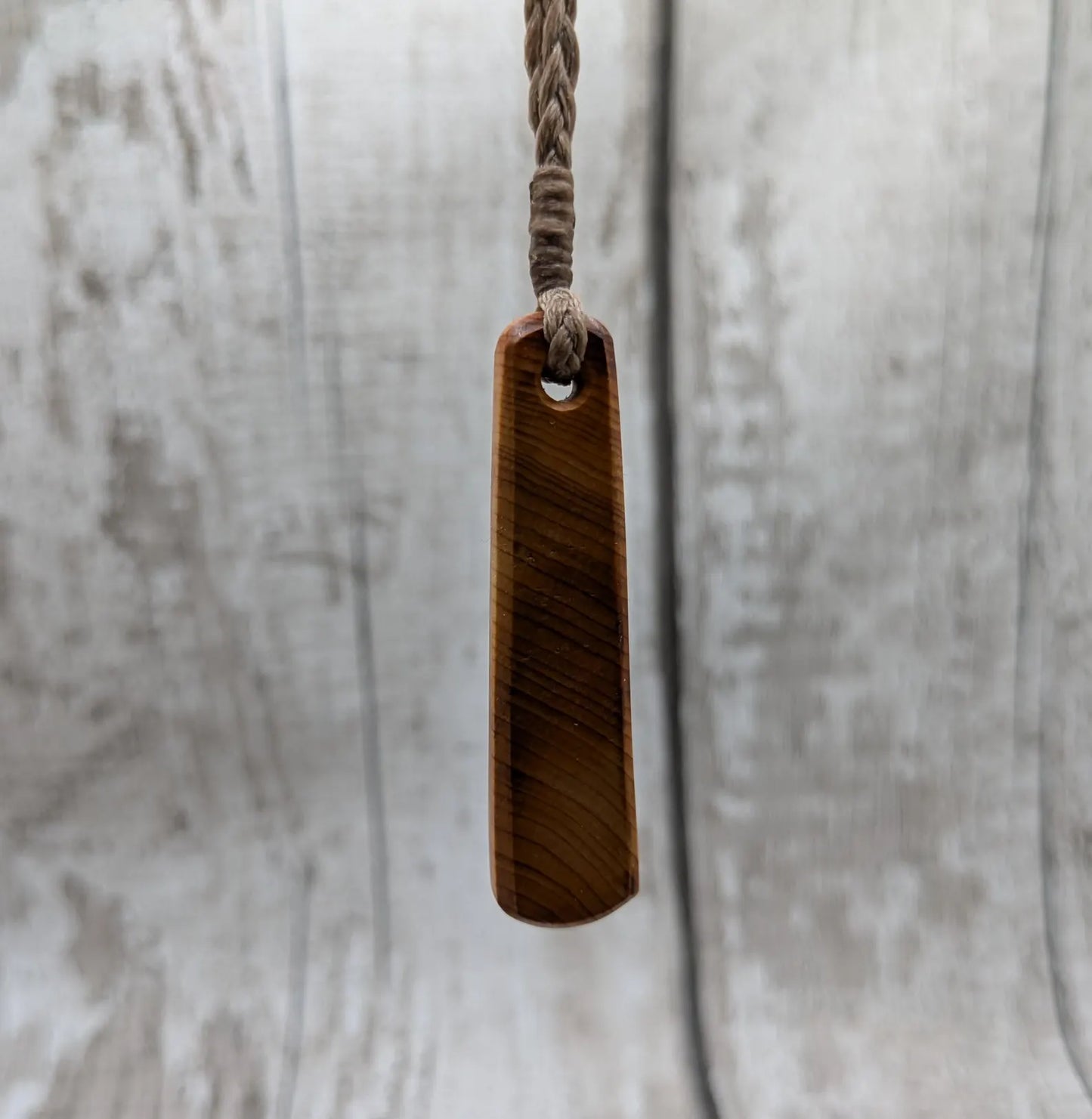 Yew wood roimata teardrop pendant.