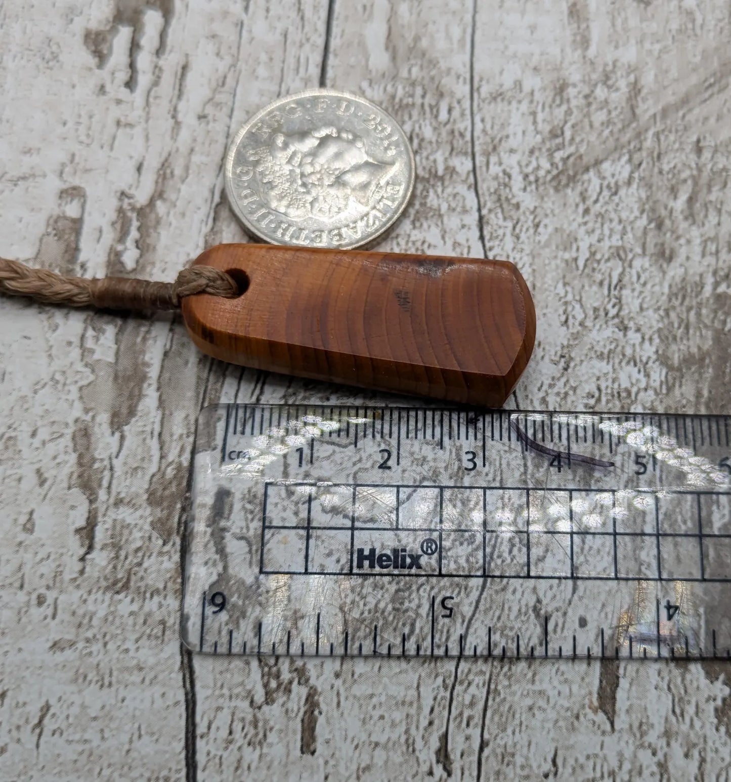 Yew wood roimata tear drop pendant.