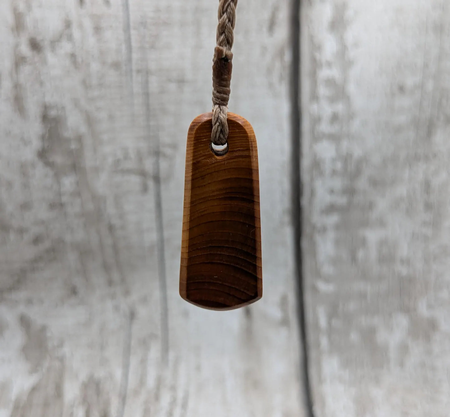 Yew wood roimata tear drop pendant.