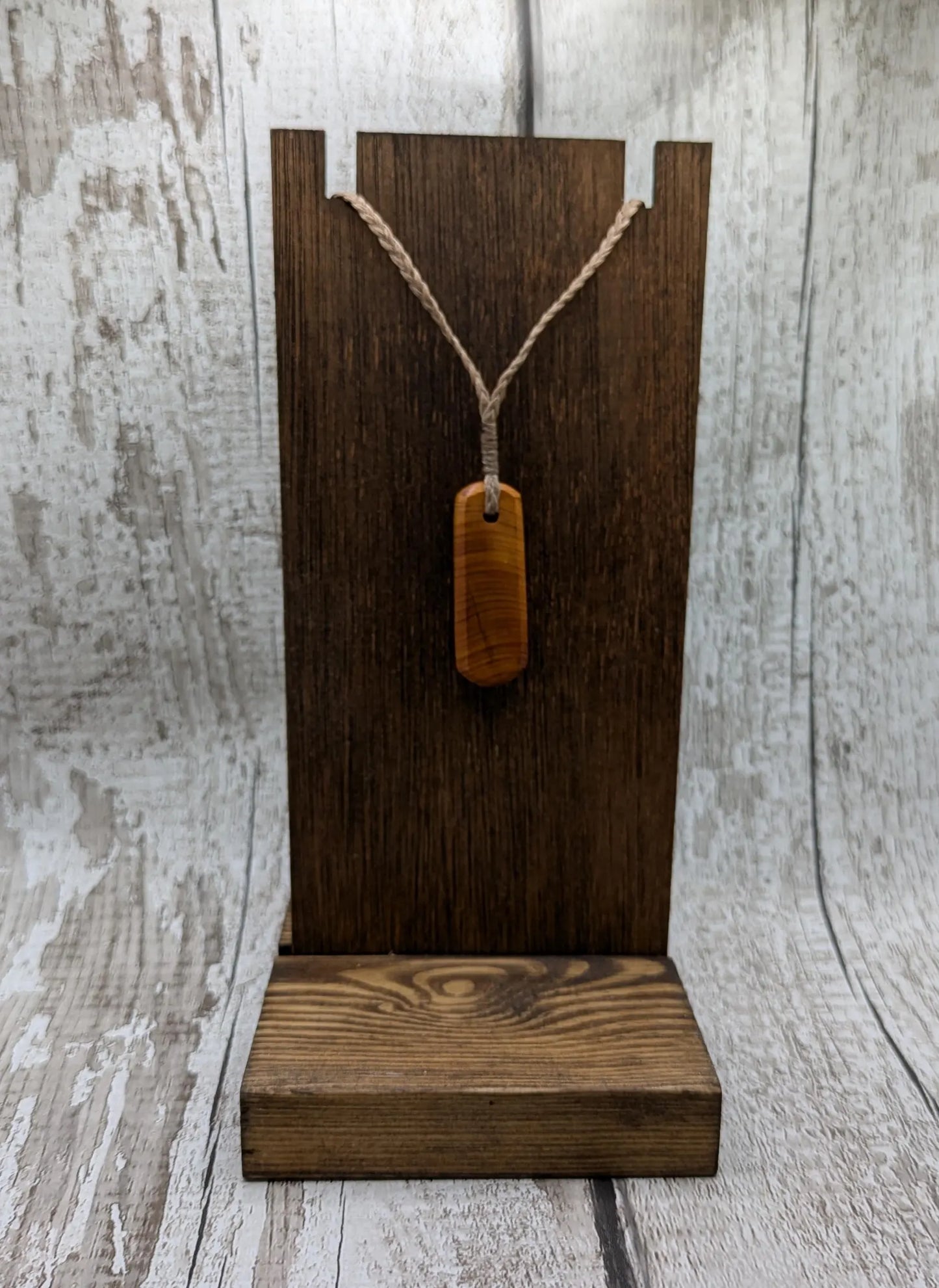 Yew wood roimata drop pendant.