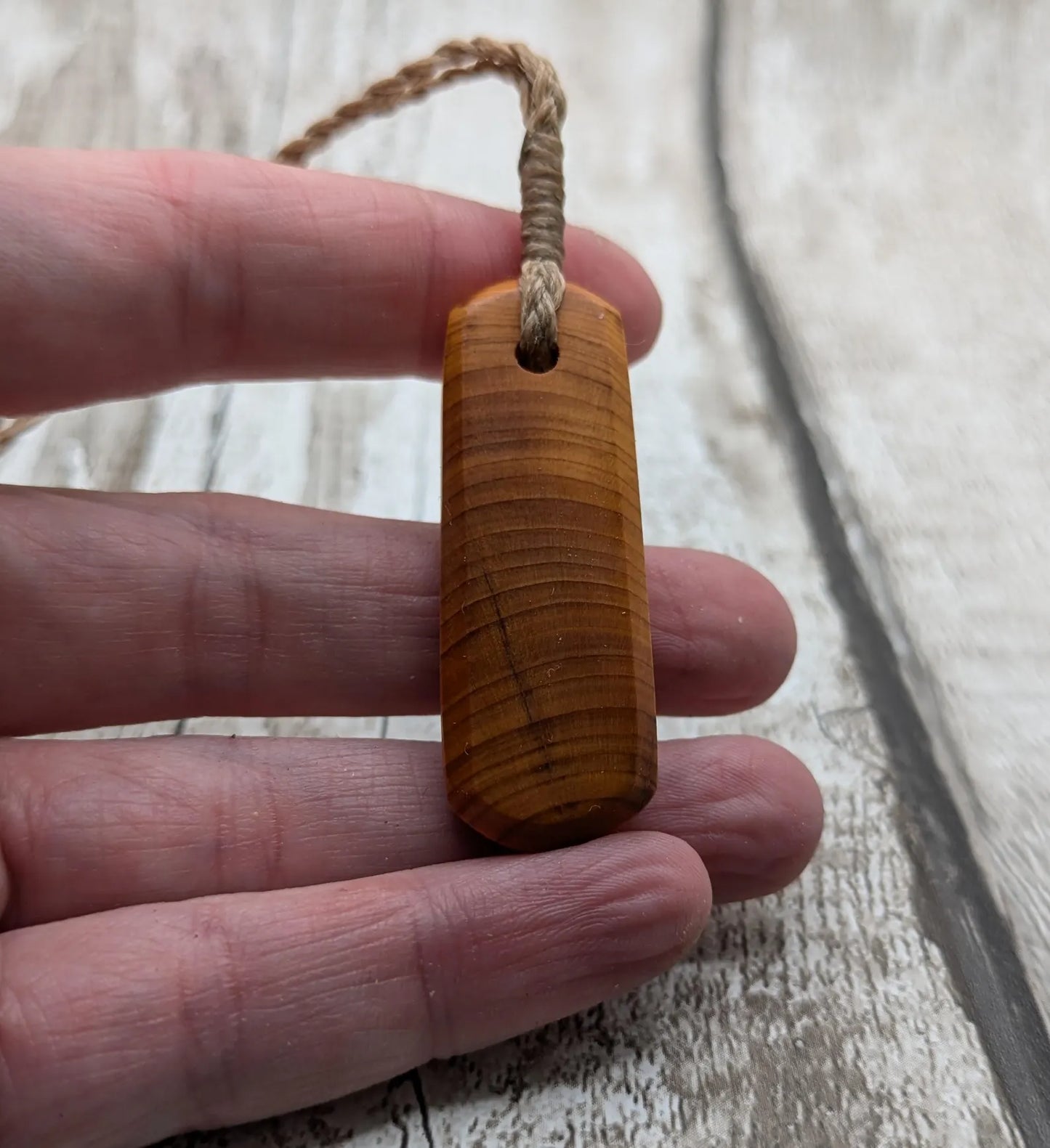 Yew wood roimata drop pendant.