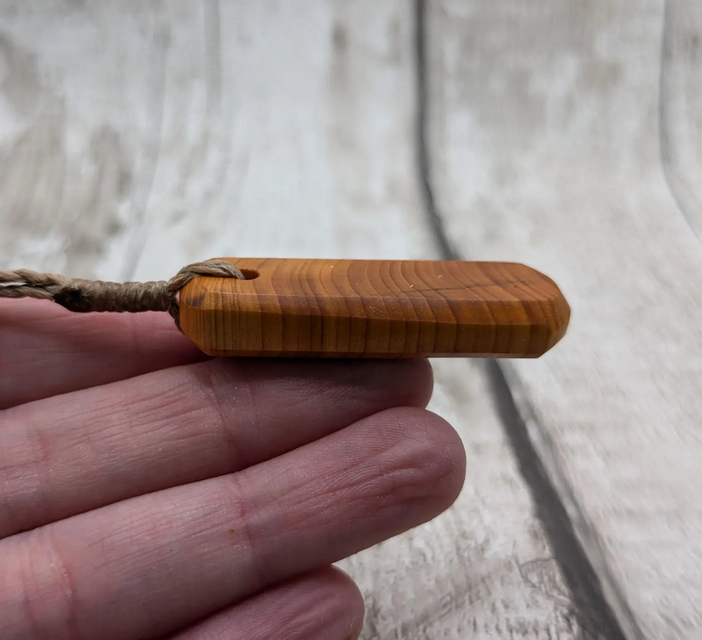 Yew wood roimata drop pendant.