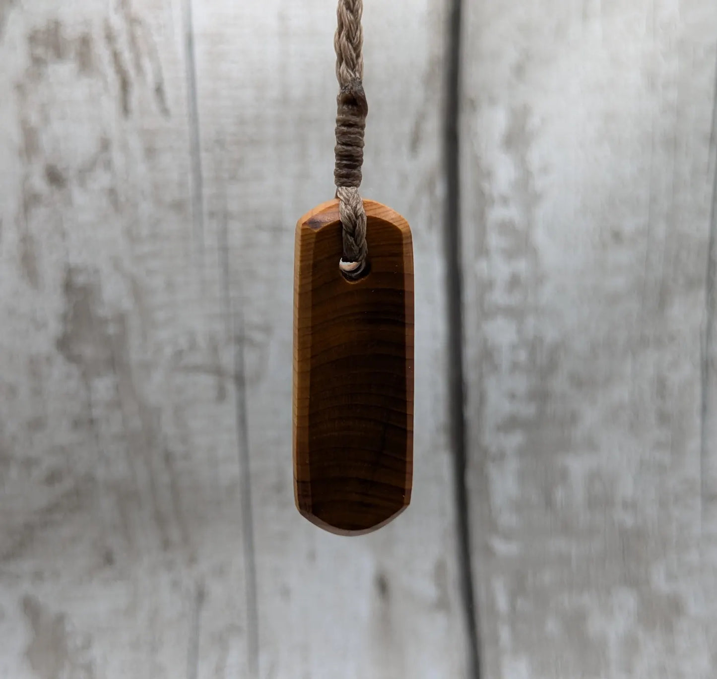 Yew wood roimata drop pendant.