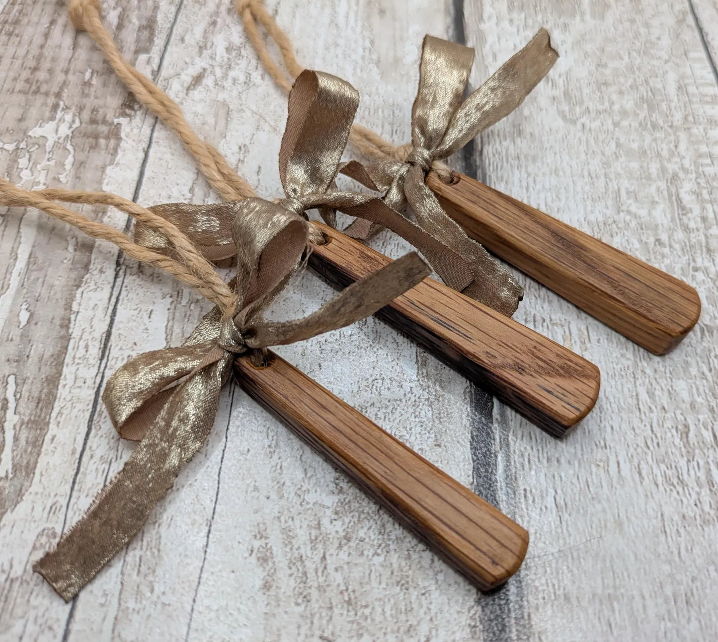 Set of Three Whiskey Barrel Oak Teardrop Christmas Ornaments – Recycled Wood Yule Decorations with Jute Hanging cord and Gold Ribbon.