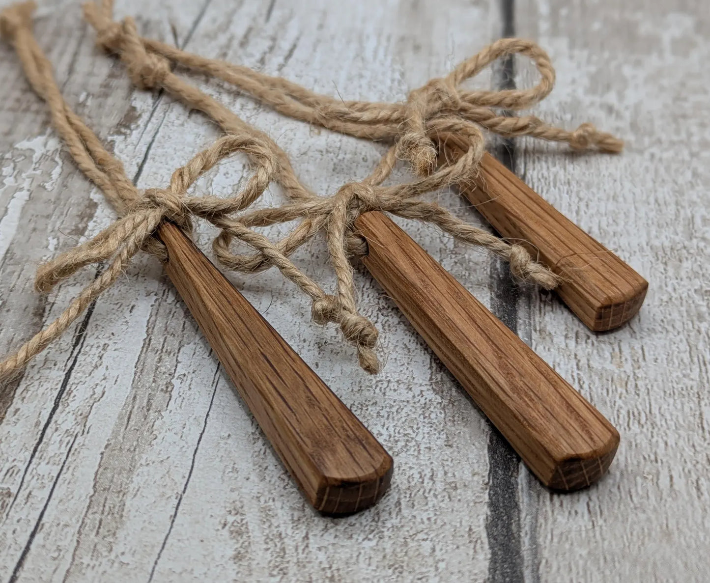 Set of Three Whiskey Barrel Oak Teardrop Christmas Ornaments – Recycled Wood Yule hanging Decorations with Jute Cord & Rustic Jute Bow.