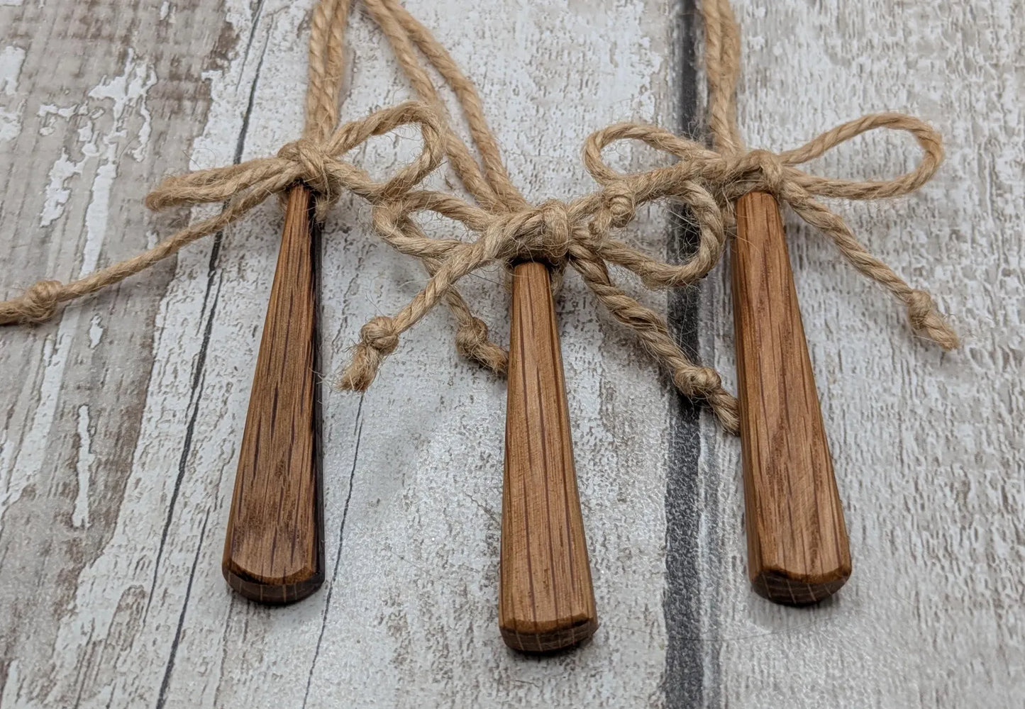Set of Three Whiskey Barrel Oak Teardrop Christmas Ornaments – Recycled Wood Yule hanging Decorations with Jute Cord & Rustic Jute Bow.