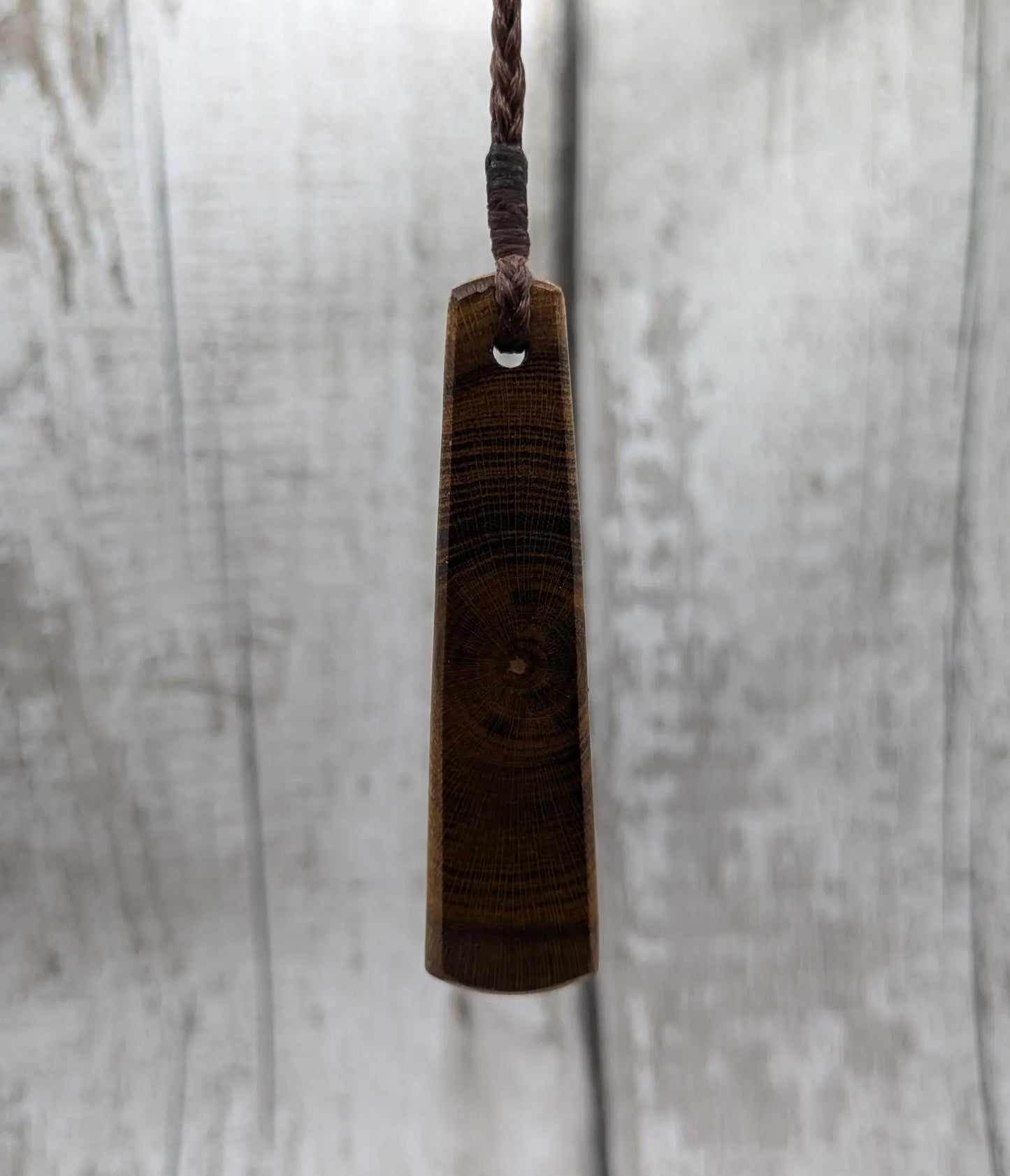 Laburnum wood roimata teardrop carved pendant.