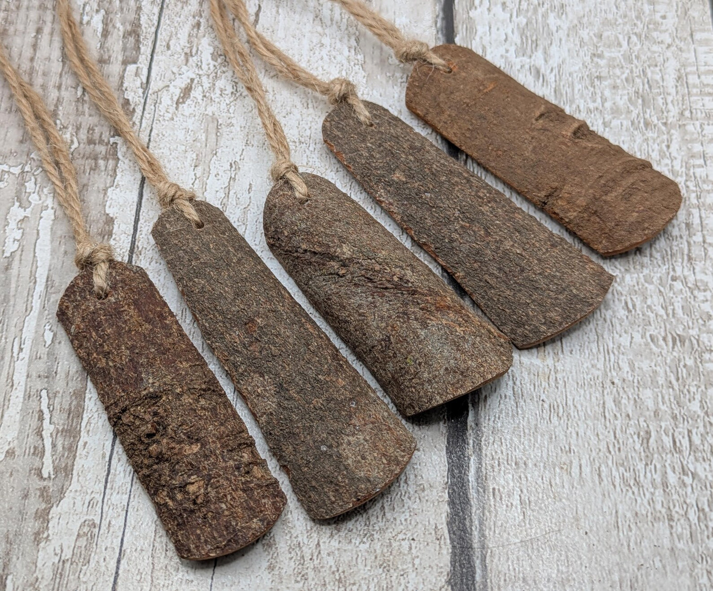 5 pack Cinnamon bark shaped Christmas decorations.