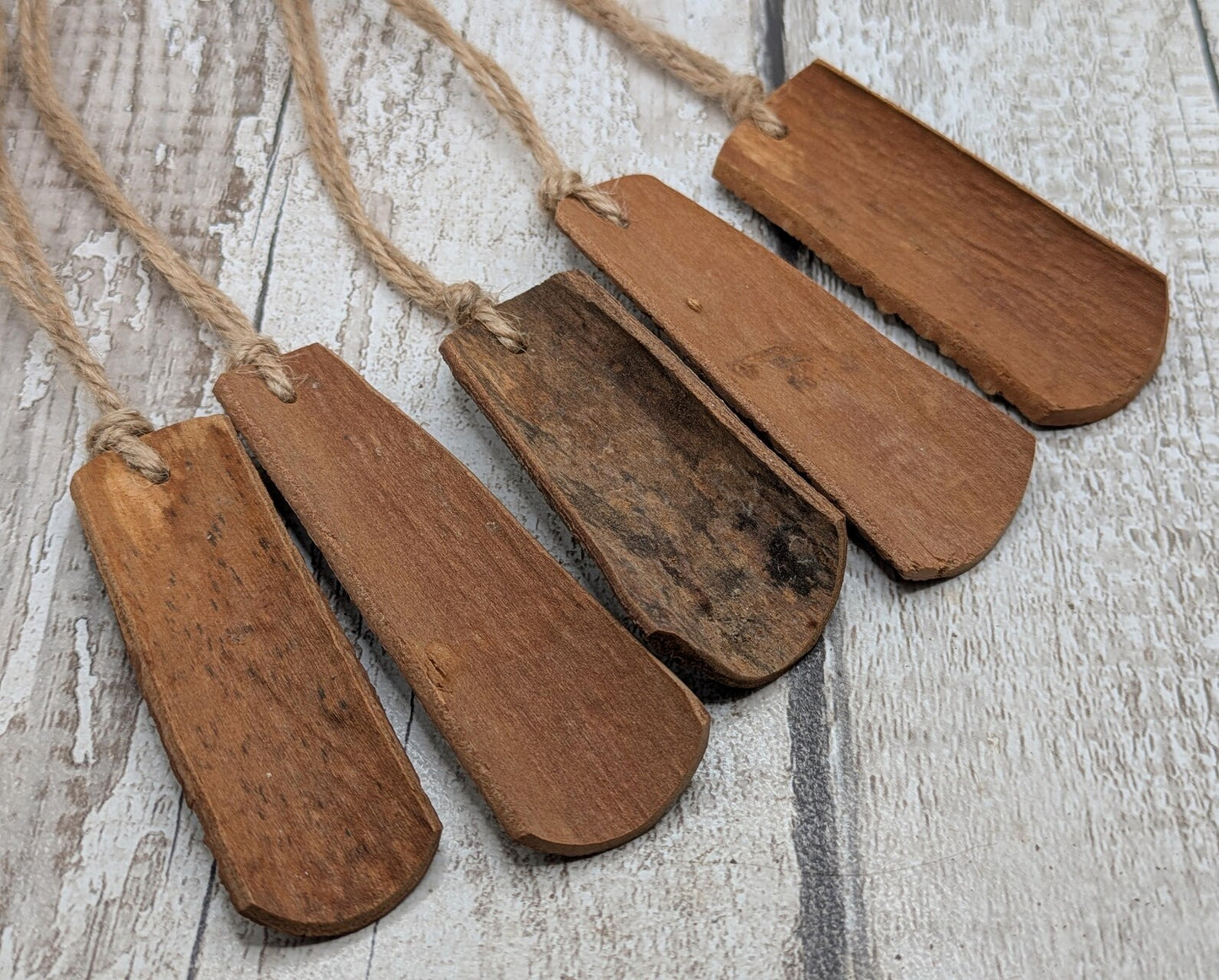 5 pack Cinnamon bark shaped Christmas decorations.