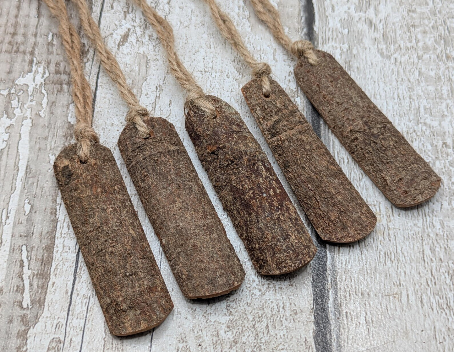5 pack large cinnamon bark seasonal hanging decoration.