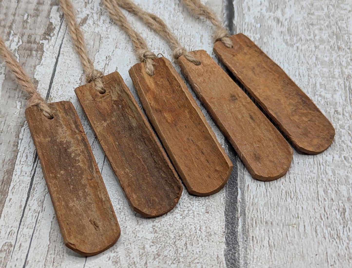 5 pack large cinnamon bark seasonal hanging decoration.