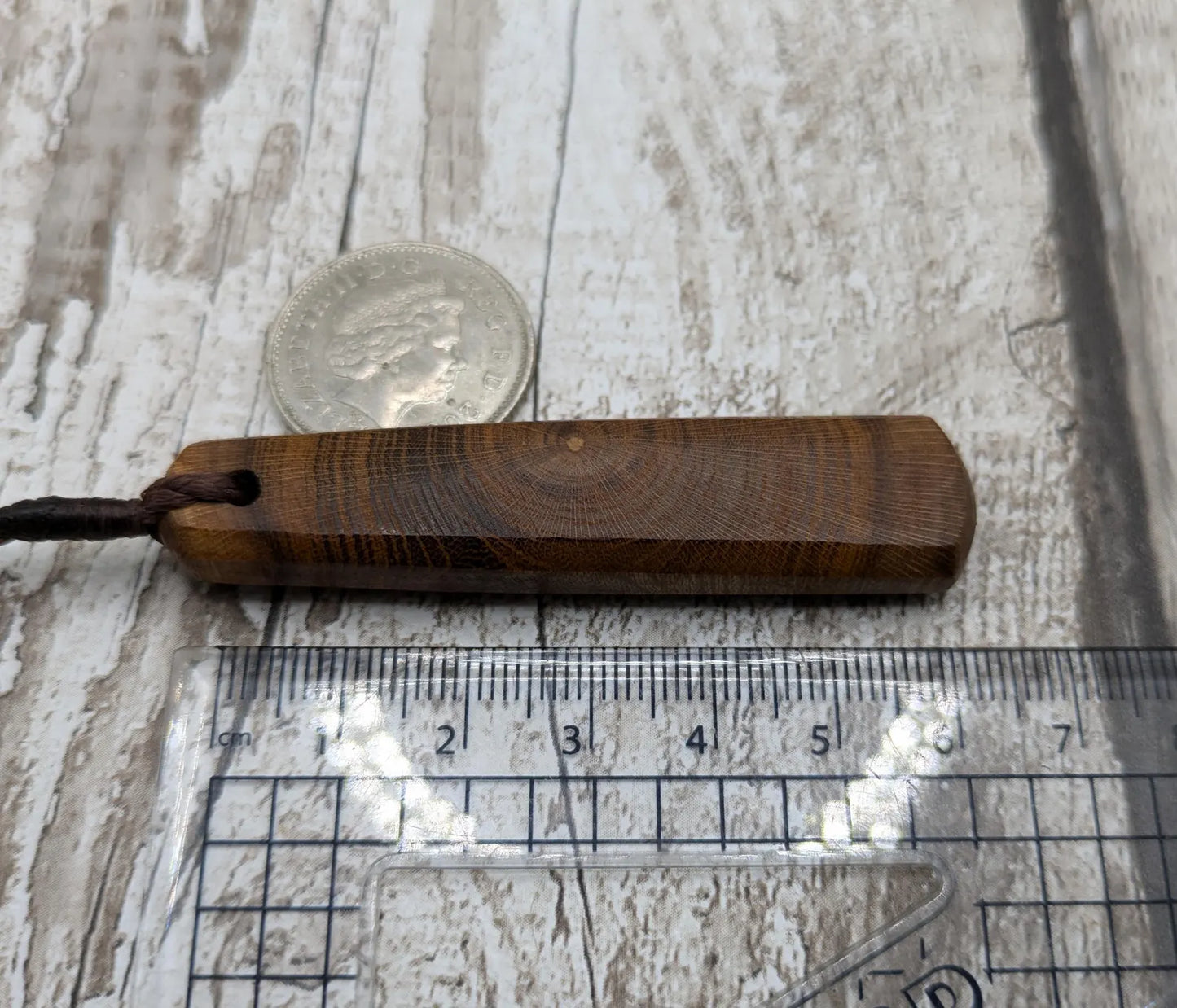 Laburnum wood roimata drop pendant.