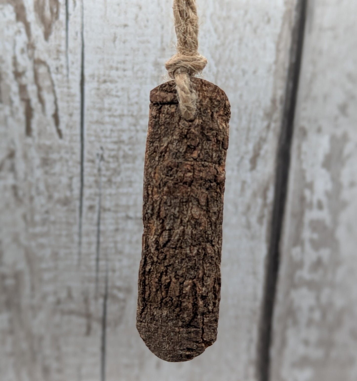 6 pack small cinnamon bark seasonal hanging decorations.