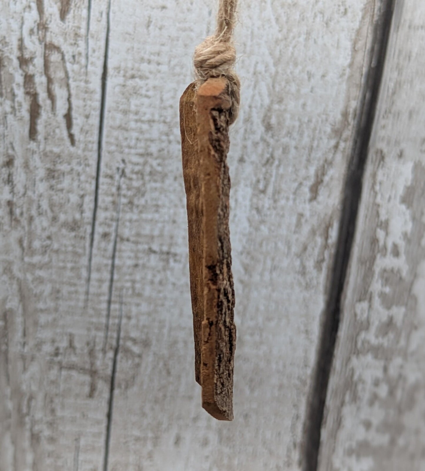 6 pack small cinnamon bark seasonal hanging decorations.