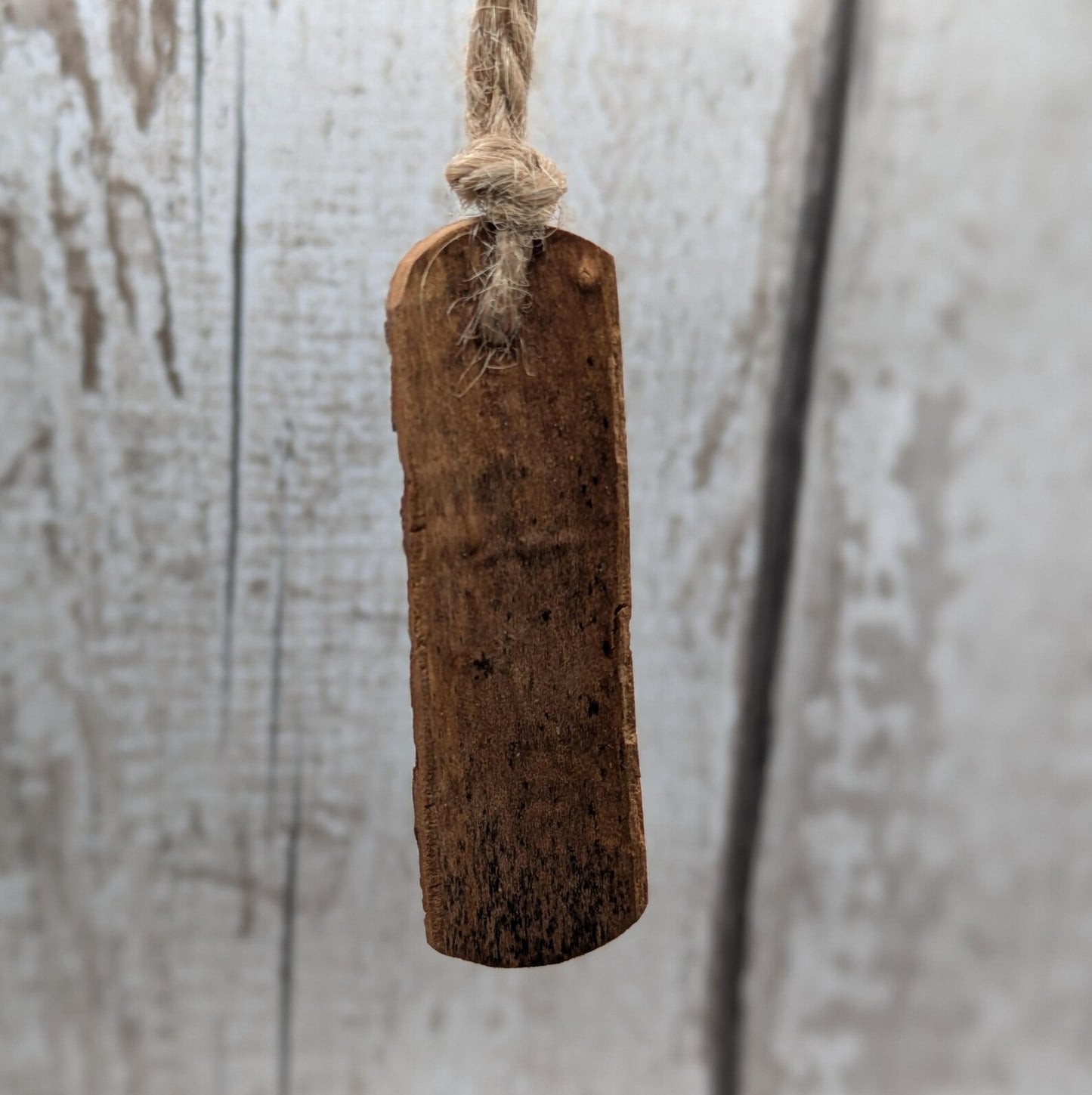 6 pack small cinnamon bark seasonal hanging decorations.