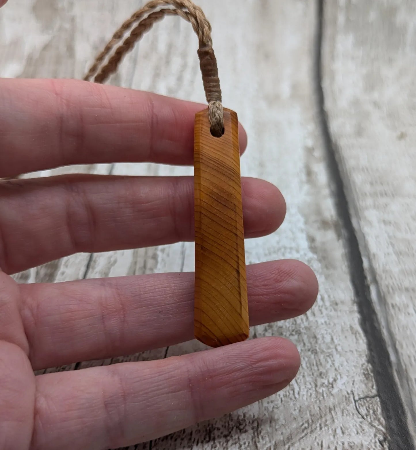 Yew wood roimata drop pendant.