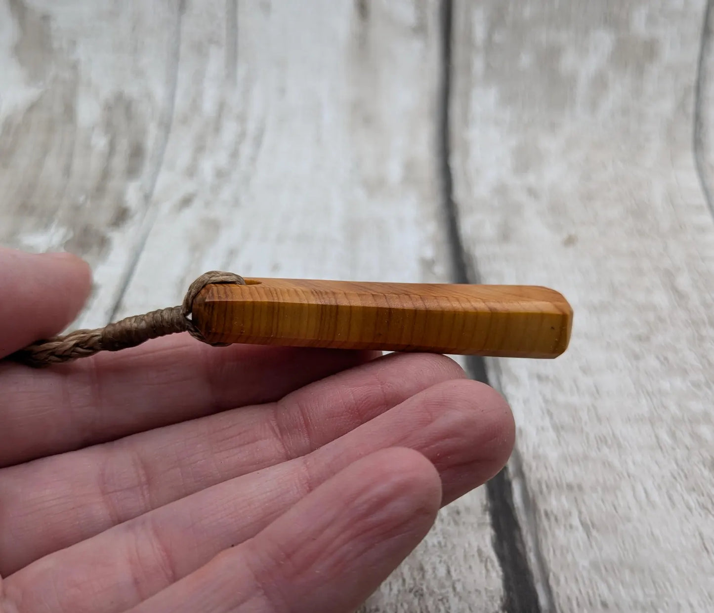 Yew wood roimata drop pendant.