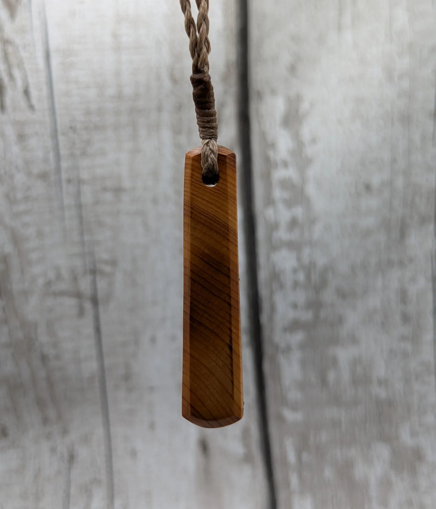 Yew wood roimata drop pendant.