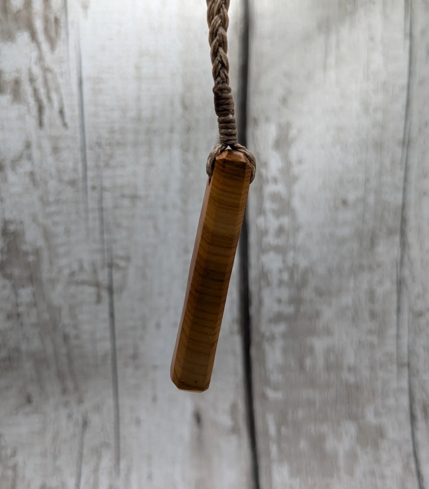 Yew wood roimata drop pendant.