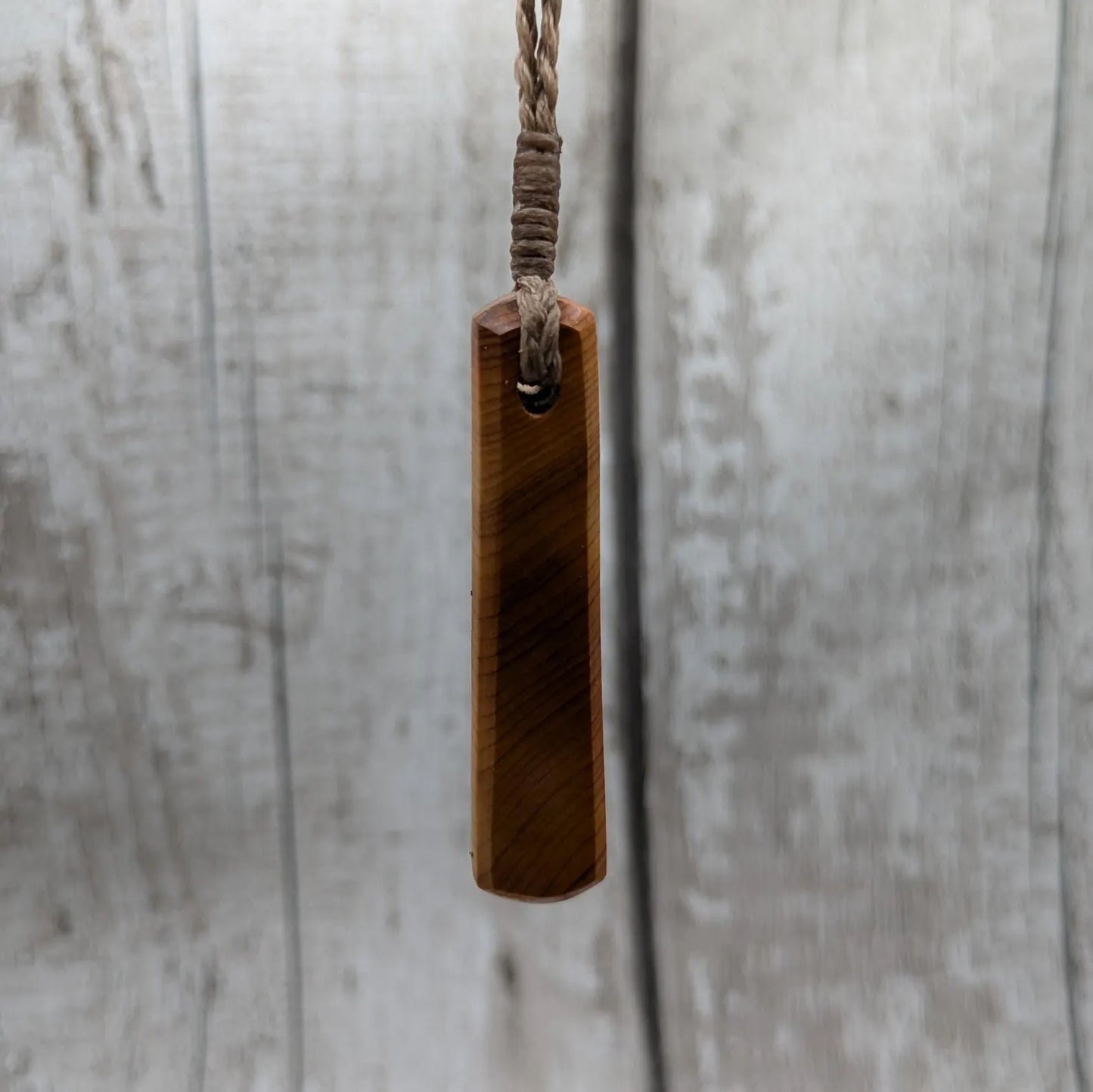 Yew wood roimata drop pendant.