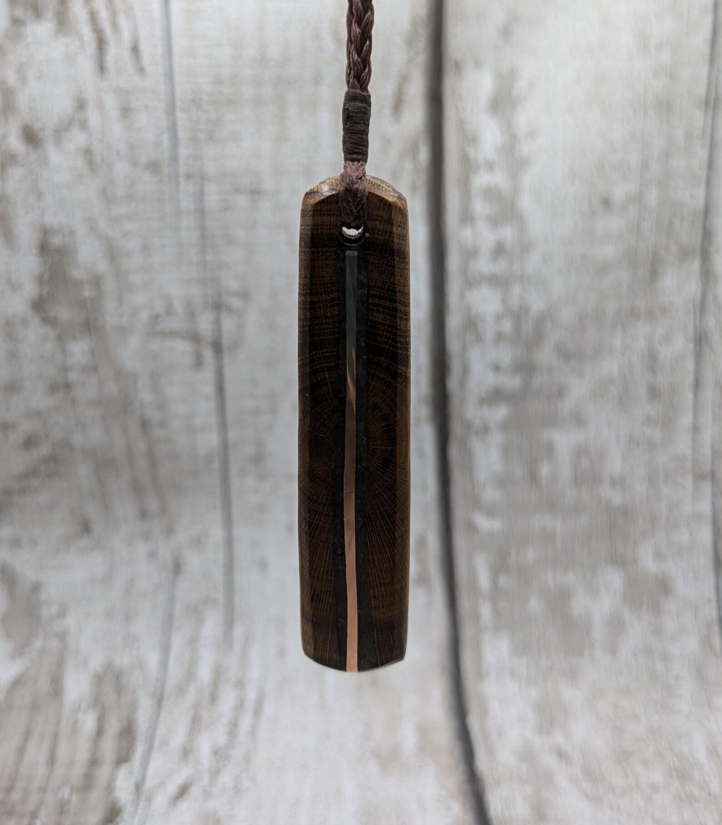 Laburnum wood roimata tear drop pendant with copper and blue kyanite.