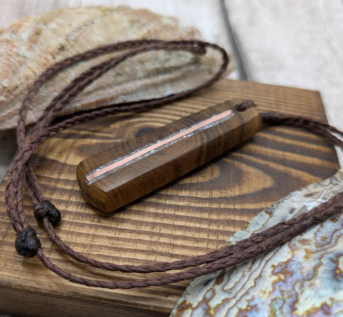 Laburnum wood roimata teardrop pendant with freshwater Pearl and copper.