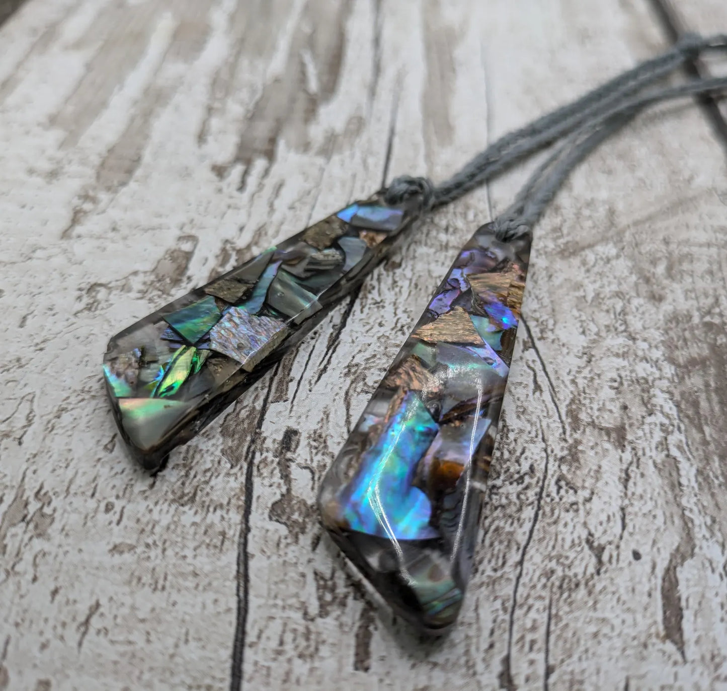 New Zealand rainbow pāua shell hanging decoration.