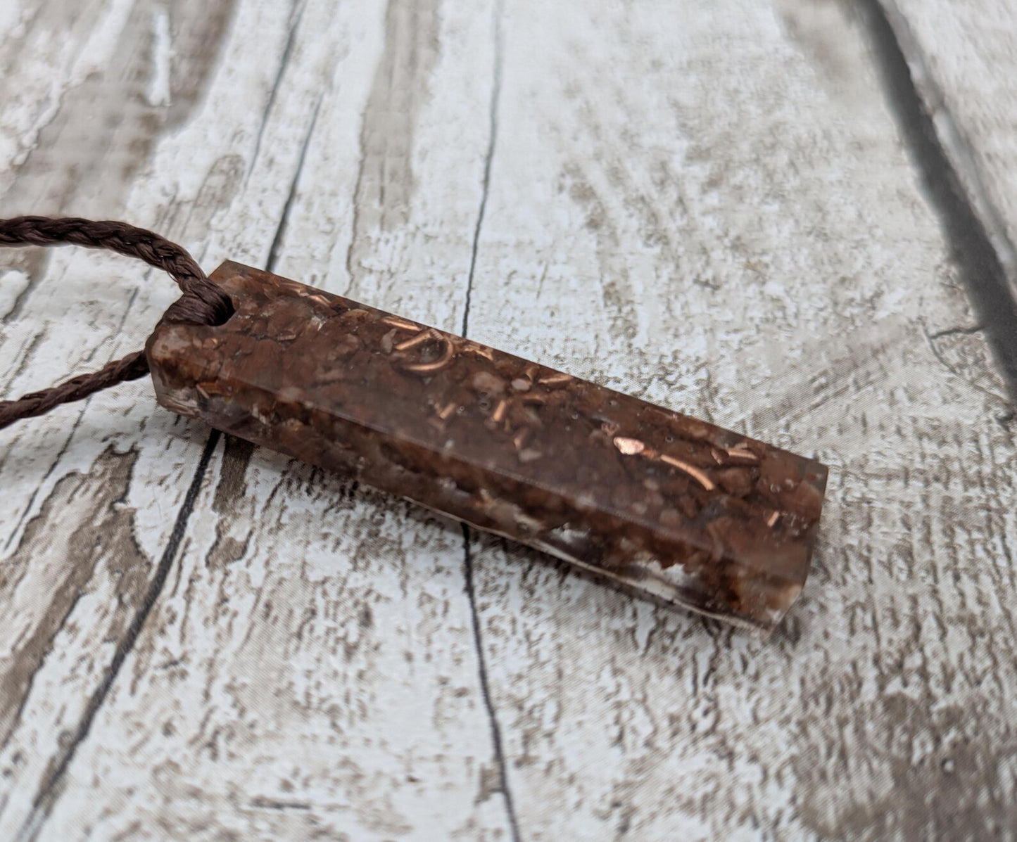 Argonite Sputnik with copper in resin.