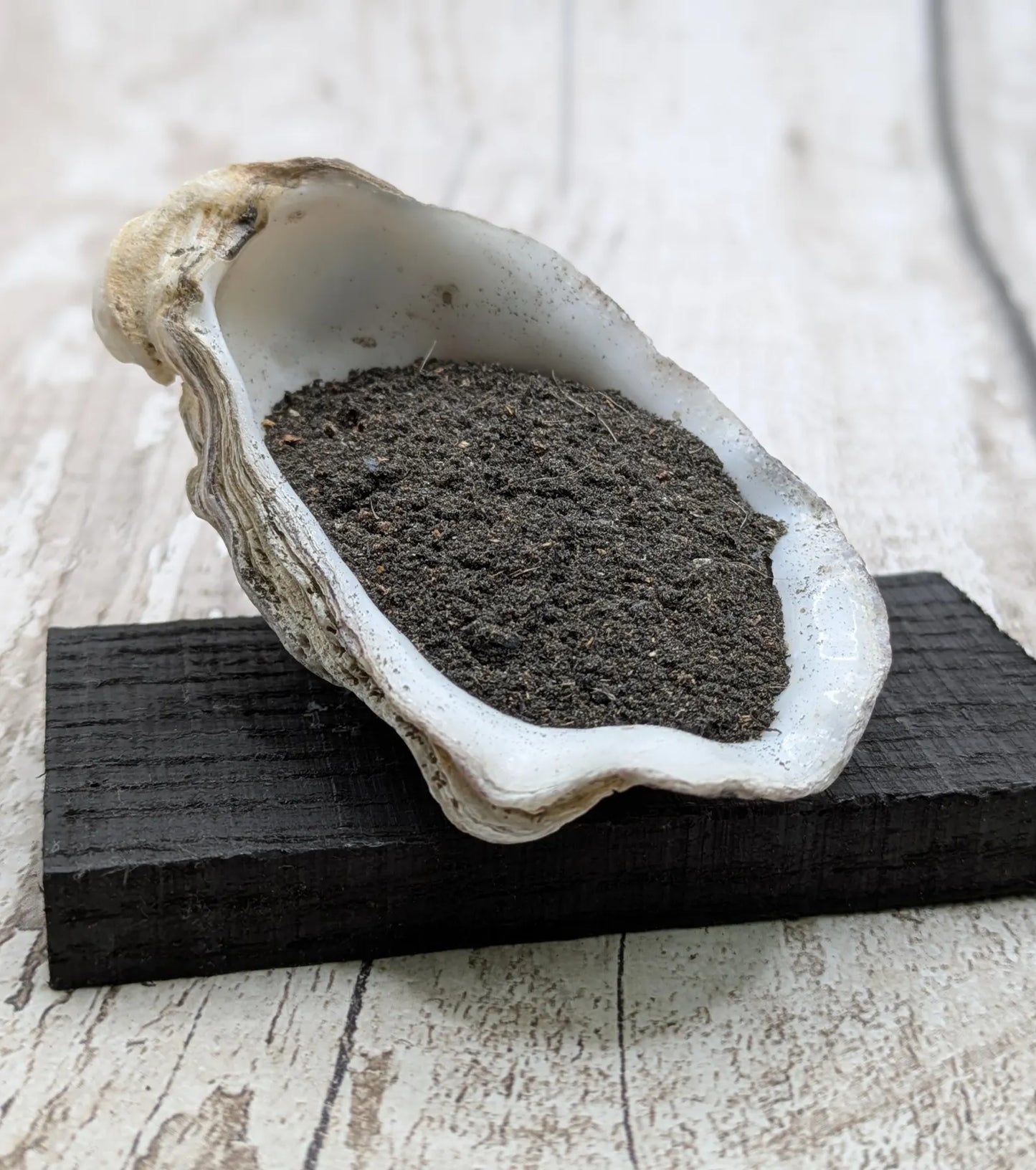 Fenland bog oak wood powder pouch.