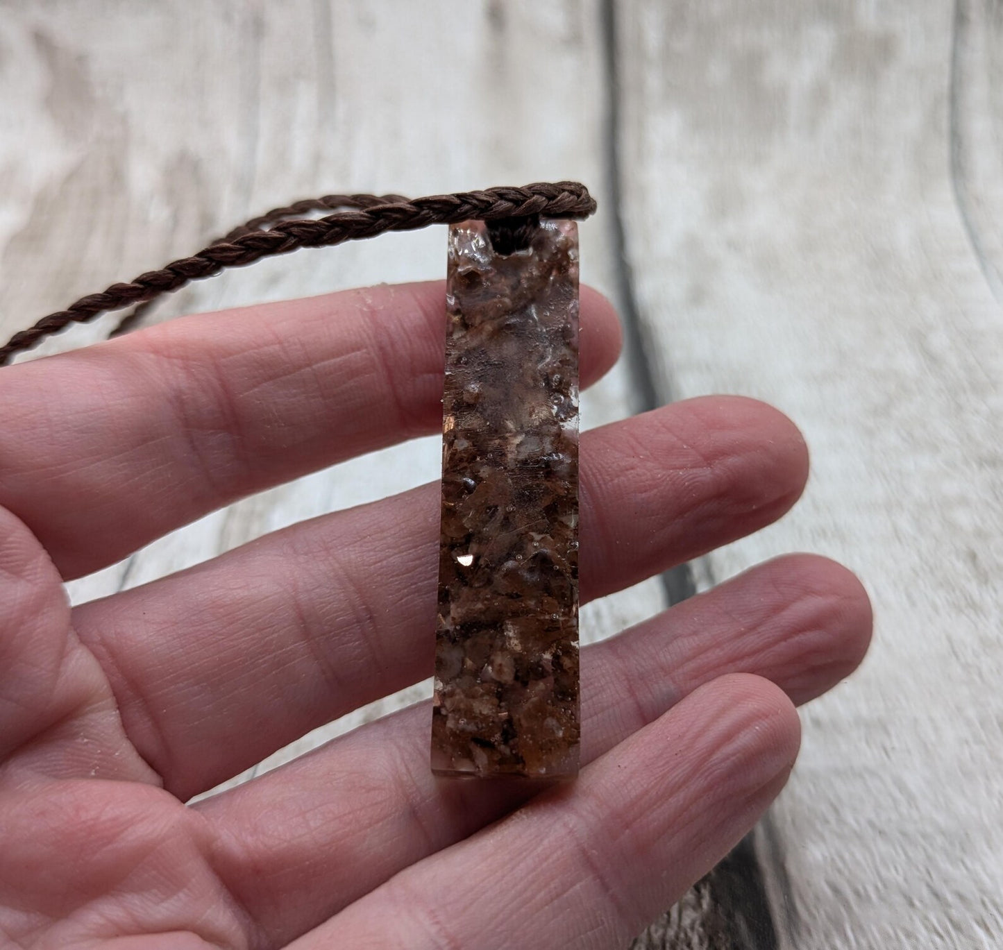 Argonite Sputnik with copper in resin.