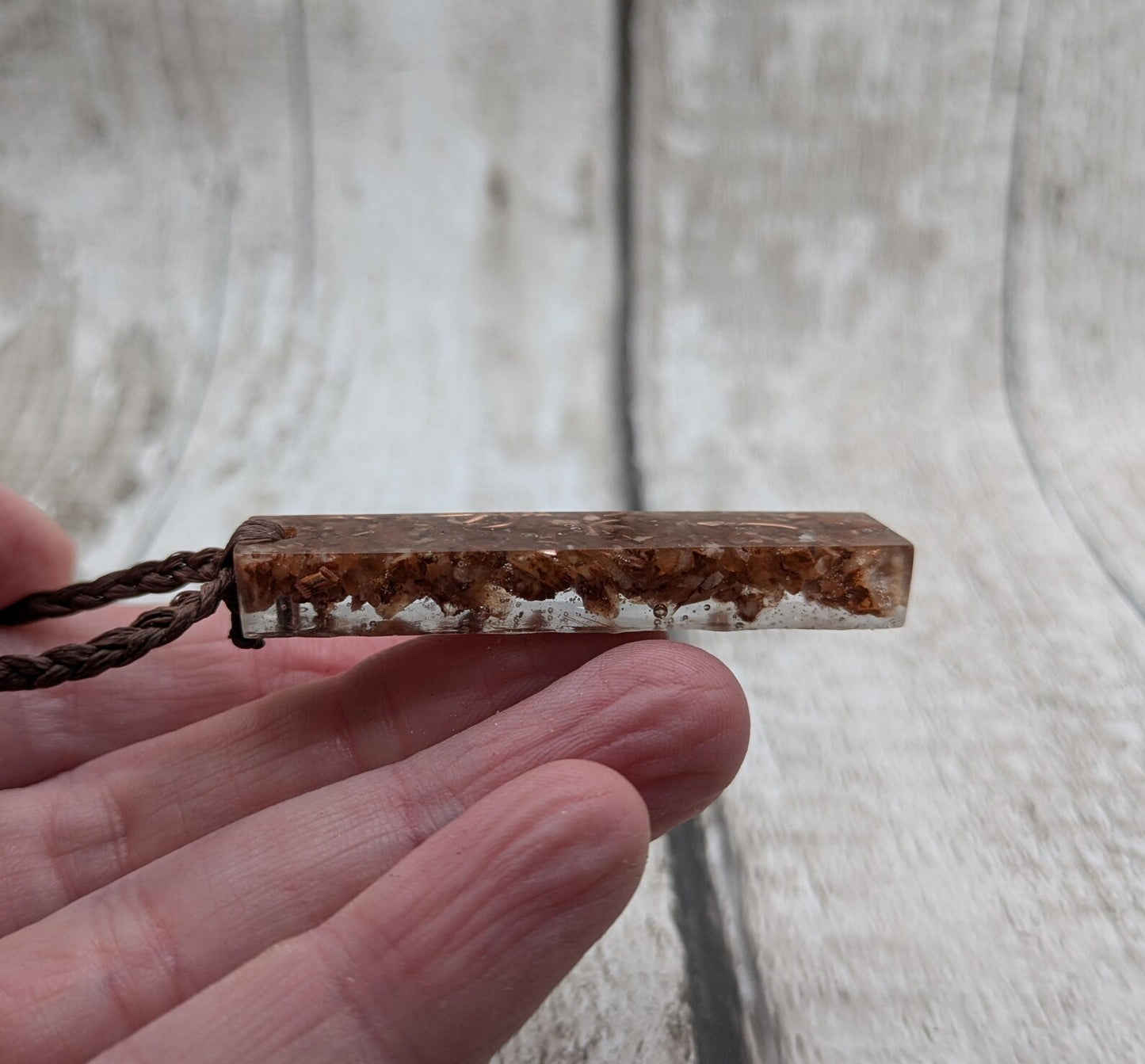 Argonite Sputnik with copper in resin.