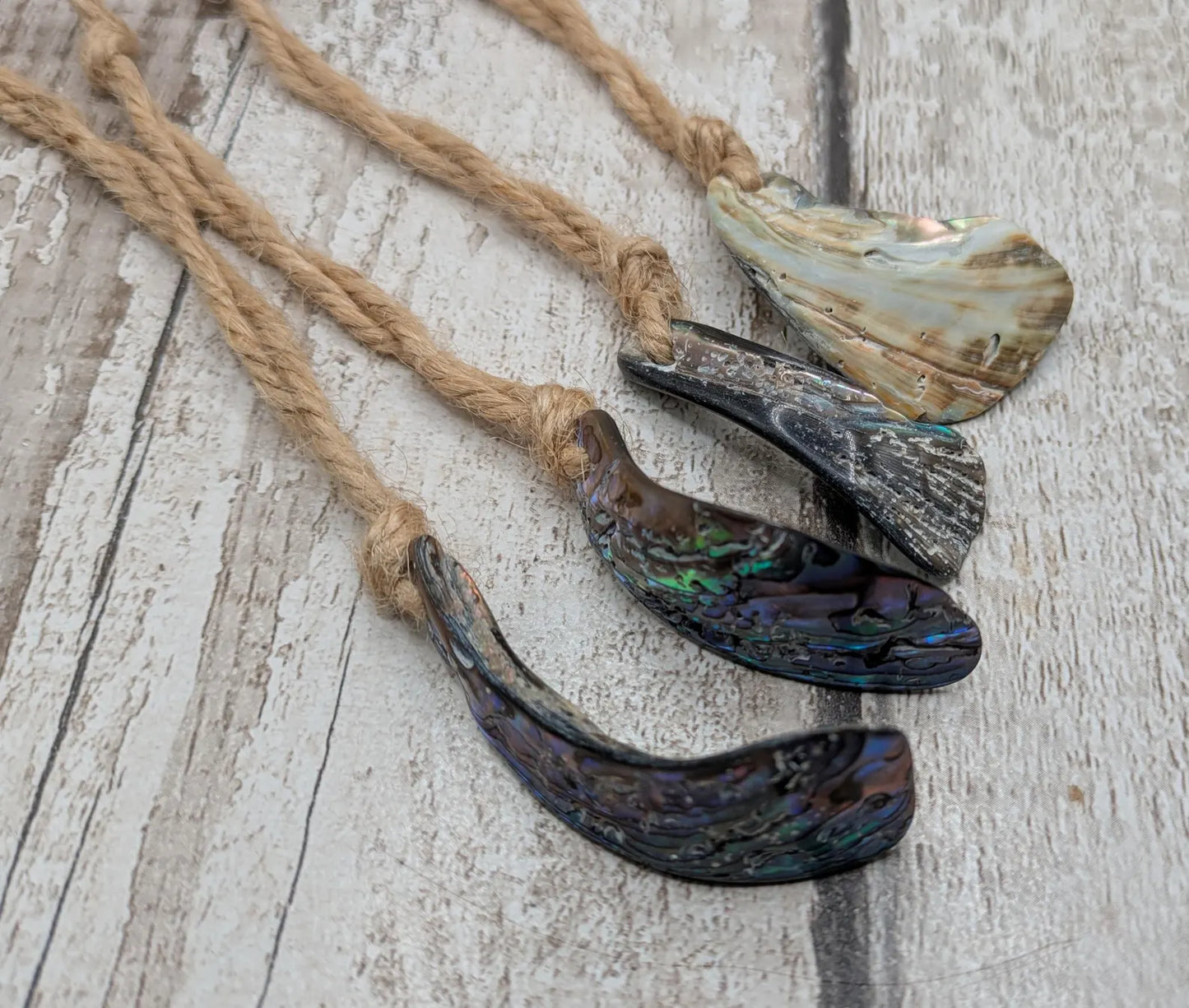 Set of Four Wild New Zealand wild Pāua Shell Ornaments – Natural Beach combed Abalone Decorations on Jute Cord for Yule for Christmas trees.