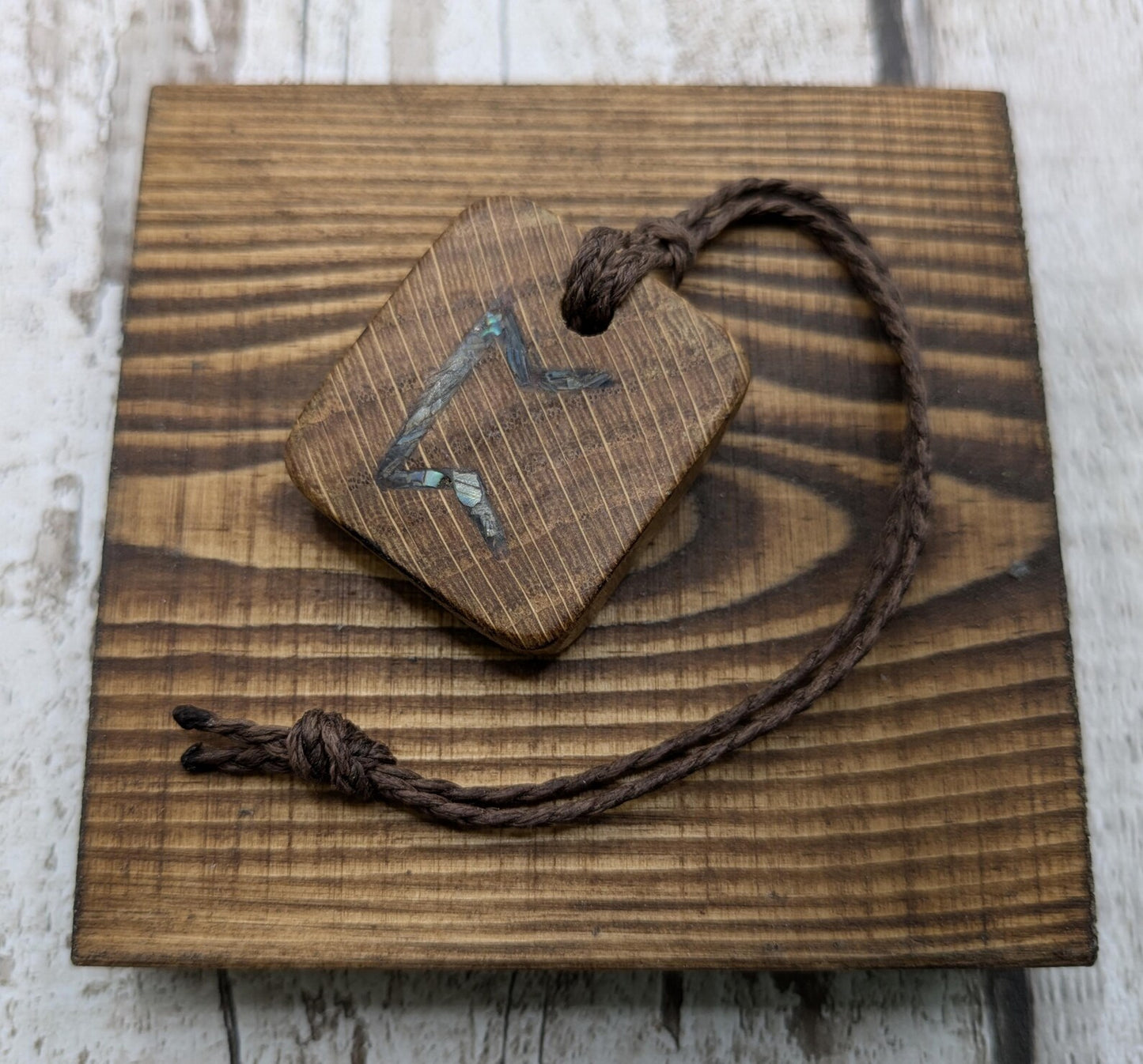Perthro oak wood rune Christmas decoration with Pāua shell inlay.