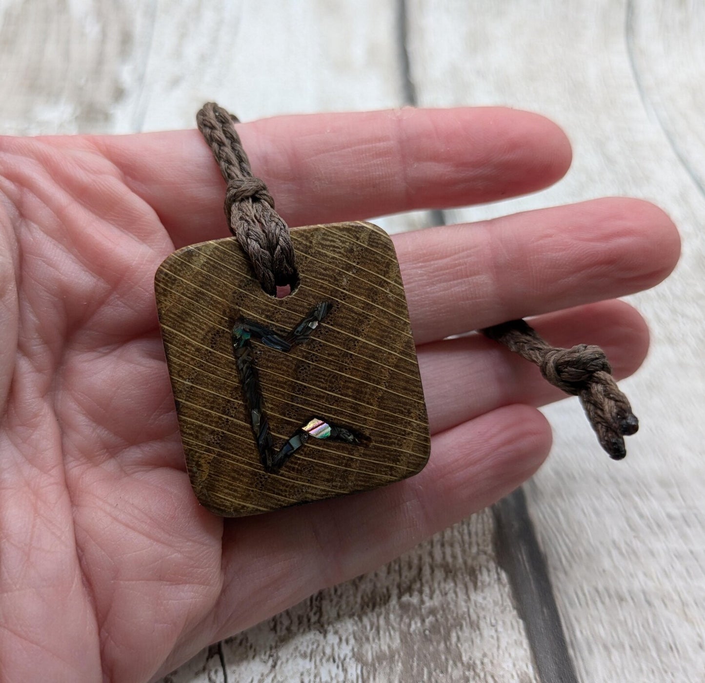 Perthro oak wood rune Christmas decoration with Pāua shell inlay.